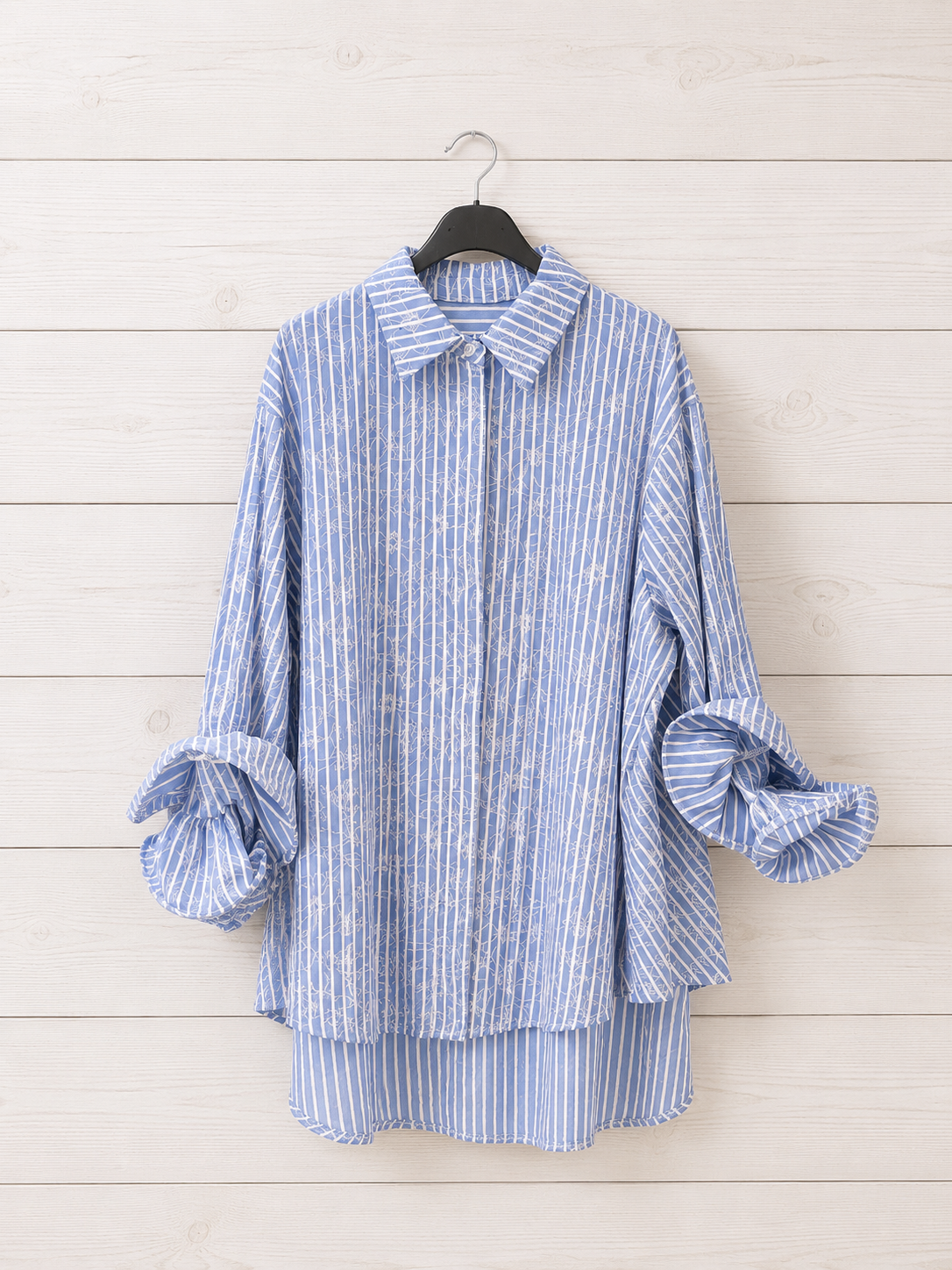 Camicia a righe con fiore
