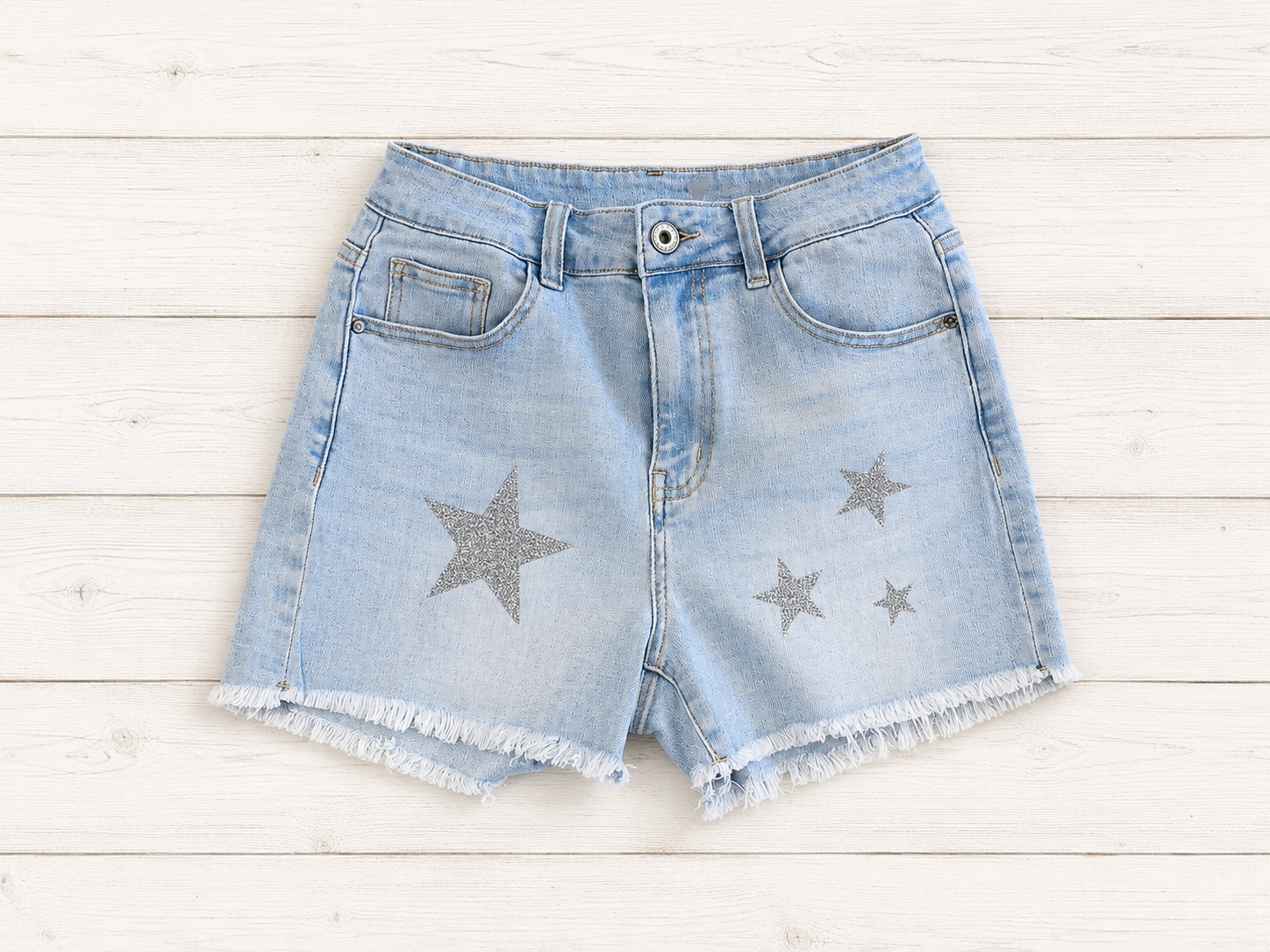 Shorts jeans con stelle in glitter